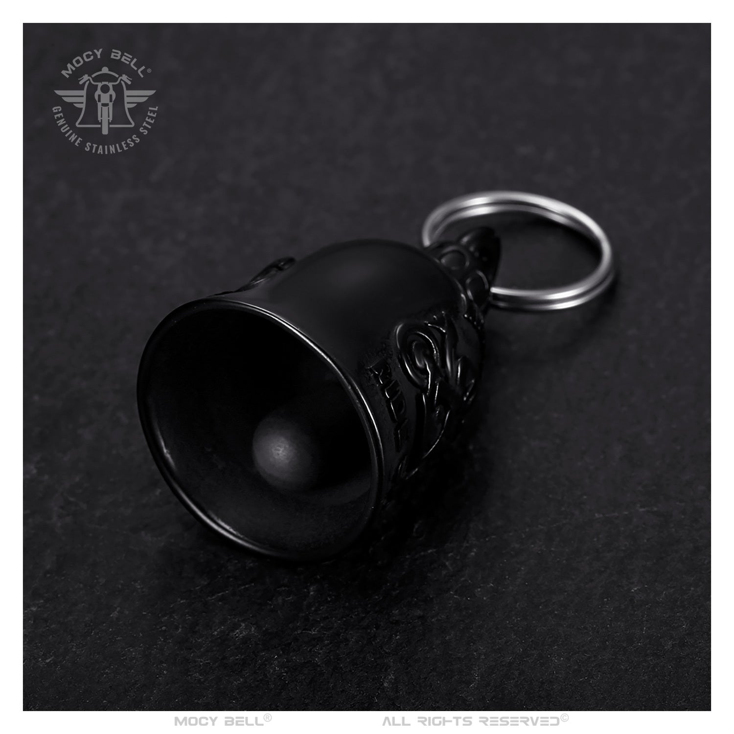 Clochette moto Ride Fast Ride Safe noire titane couchée montrant les détails intérieurs et la finition en acier inoxydable 316L